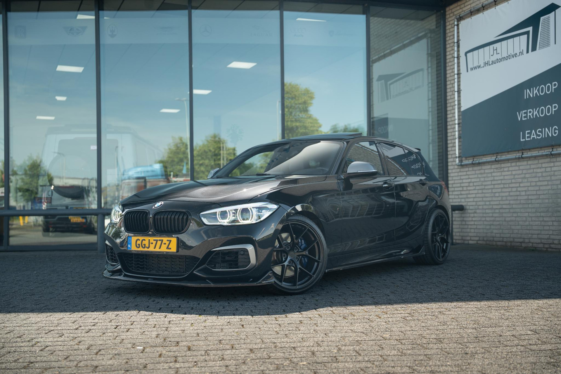 BMW 1-serie M140I XDrive High Exe.*AKRA*KW*MAXTON*440PK*PANO*